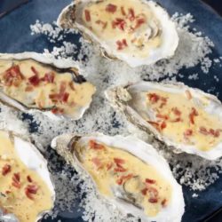 WARM OYSTERS WITH BAYONNE HAM AND ESPELETTE CHILLI CREAM